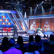 Michael Strahan chats with contestants and celebrity players during a taping of The $100,000 Pyramid (Photo: Lou Rocco/ABC)